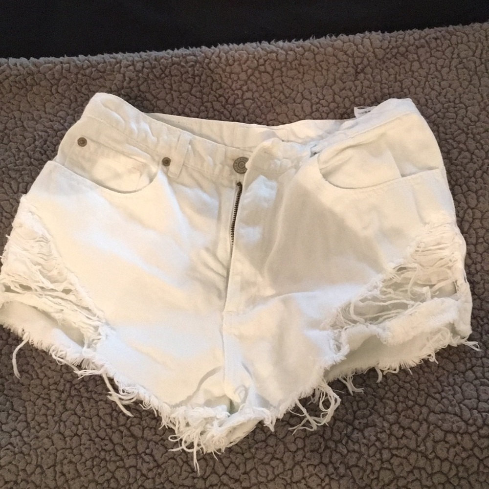 Ripped white denim shorts